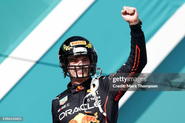 Race winner Max Verstappen of the Netherlands and Oracle Red Bull Racing celebrates on the podium during the F1 Grand Prix of Miami at the Miami...