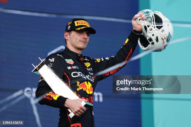 Race winner Max Verstappen of the Netherlands and Oracle Red Bull Racing celebrates on the podium during the F1 Grand Prix of Miami at the Miami...