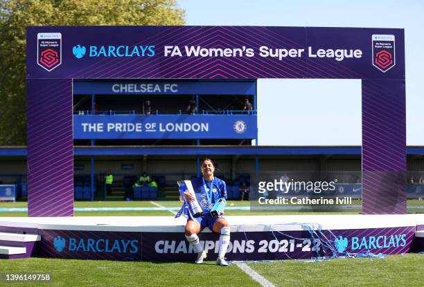 Sam Kerr of Chelsea sits with the Barclays FA Women's Super League trophy and Golden boot award following the Barclays FA Women's Super League match...