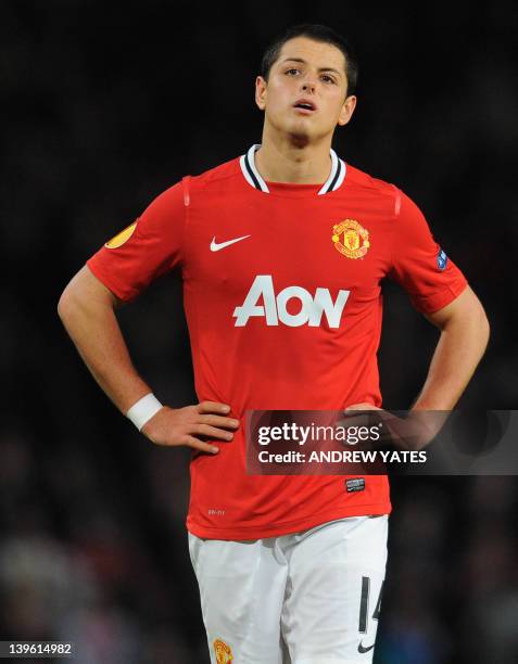 Manchester United's Mexican forward Javier Hernández reacts during the UEFA Europa League round of 32 second leg football match between Manchester...