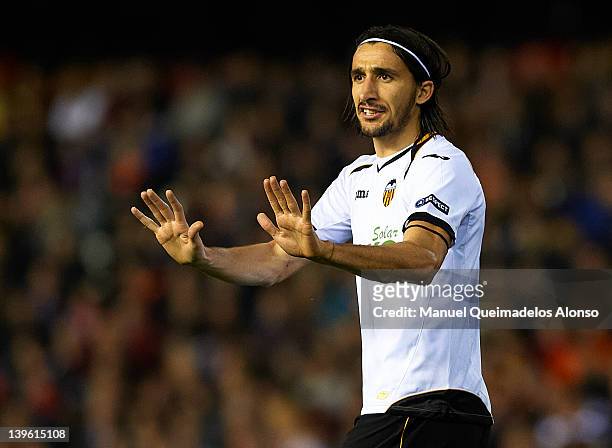 Mehmet Topal of Valencia reacts during the UEFA Europa League Round of 32 second leg match between Valencia CF and Stoke City FC at Estadio Mestalla...