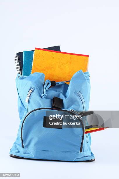 blue school bag - rugzak stockfoto's en -beelden