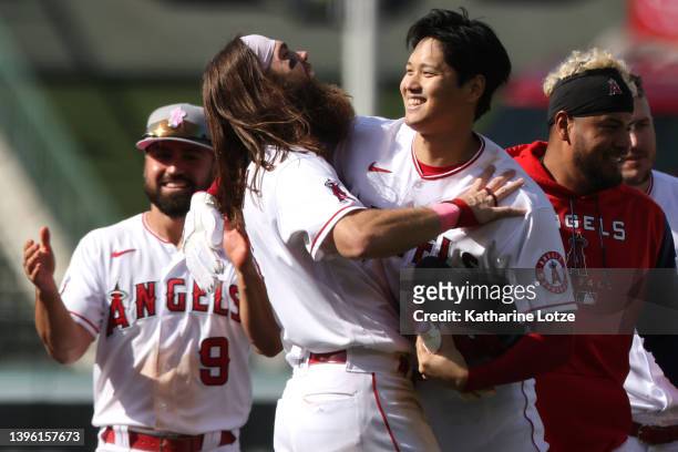 Brandon Marsh and Shohei Ohtani of the Los Angeles Angels celebrate a 5-4 win against the Washington Nationals at Angel Stadium of Anaheim on May 08,...
