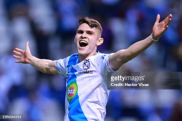 Israel Reyes of Puebla celebrates after scoring a penalty in the shootout and winning the playoff match between Puebla and Mazatlan FC as part of the...