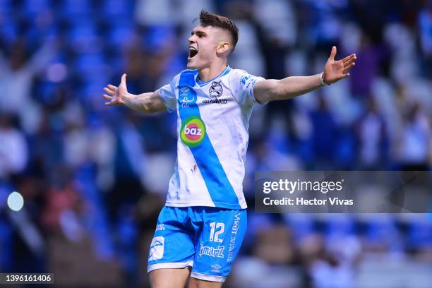 Israel Reyes of Puebla celebrates after scoring a penalty in the shootout and winning the playoff match between Puebla and Mazatlan FC as part of the...