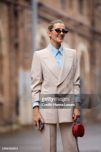 Kate Waterhouse is seen wearing Gucci suit and bag at Afterpay Australian Fashion Week 2022 on May 09, 2022 in Sydney, Australia.