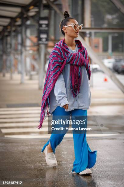 Zahli Napier wearing Missoni shawl, Lioness shirt, Vintage Harleu Davidson at Afterpay Australian Fashion Week 2022 on May 09, 2022 in Sydney,...
