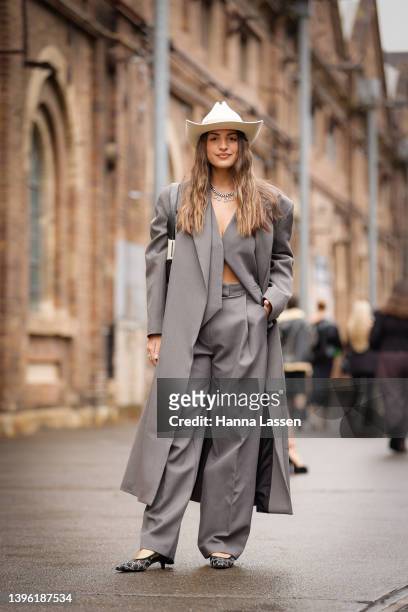 Jade tuncdoruk wearing Camilla and Marc suit, Gucci shoes bag and necklace is seen wearing at Afterpay Australian Fashion Week 2022 on May 09, 2022...
