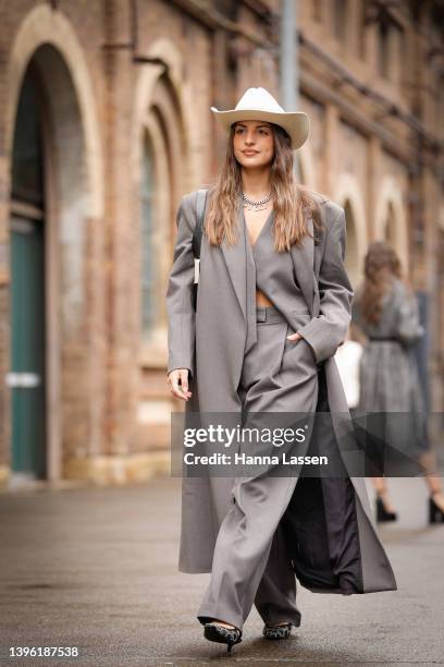 Jade tuncdoruk wearing Camilla and Marc suit, Gucci shoes bag and necklace is seen wearing at Afterpay Australian Fashion Week 2022 on May 09, 2022...