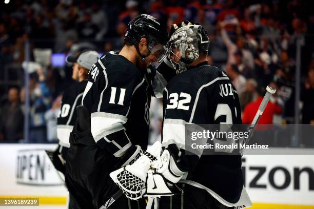 Anze Kopitar and Jonathan Quick of the Los Angeles Kings celebrate a 4-0 win against the Edmonton Oilers after Game Four of the First Round of the...
