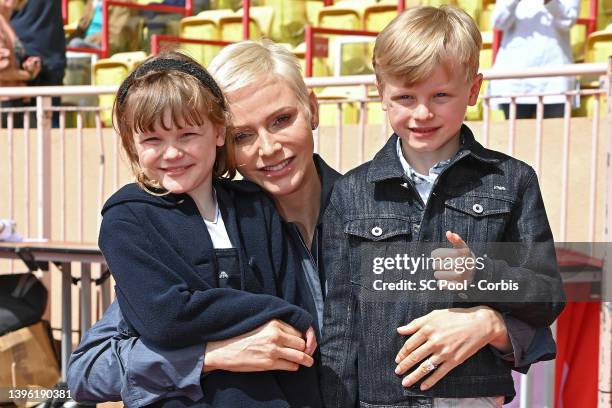 Princess Gabriella of Monaco, Princess Charlene of Monaco and Prince Jacques of Monaco attend the Sainte Devote Rugby Tournament on May 07, 2022 in...