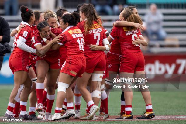 Olivia De Couvreur of Canada along with with teammates Fancy Bermudez, Florence Symonds and Renee Gonzalez celebrate a victory against the USA during...