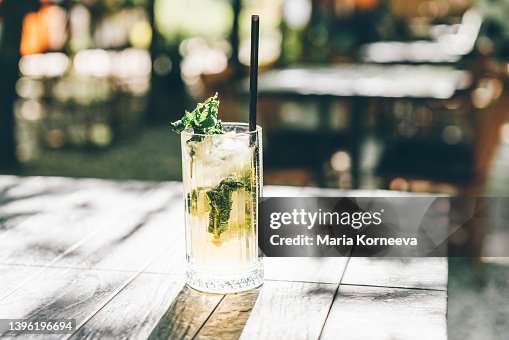 Summer cold drink, lemonade on table in sunny day. Summer cold drink, lemonade on table in sunny day.