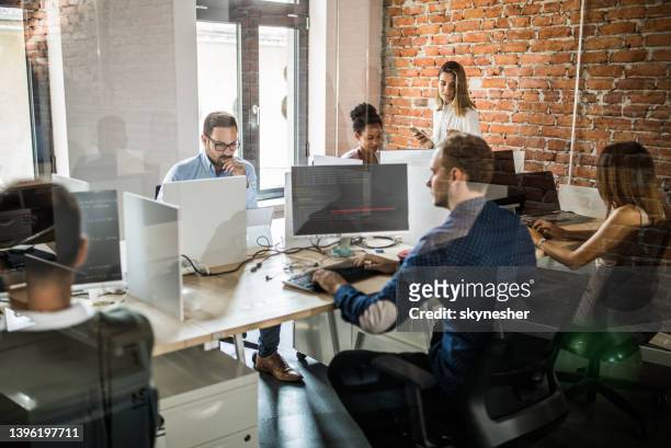 large group of computer programmers working in the office. - software engineering stock pictures, royalty-free photos & images