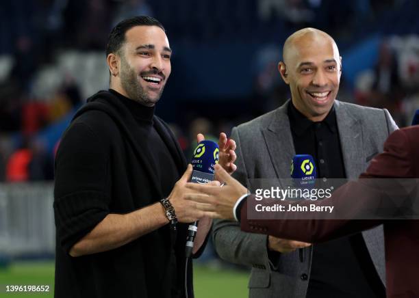 Adil Rami of Troyes Thierry Henry, pundit for Amazon Prime Video following the Ligue 1 Uber Eats match between Paris Saint-Germain and ESTAC Troyes...