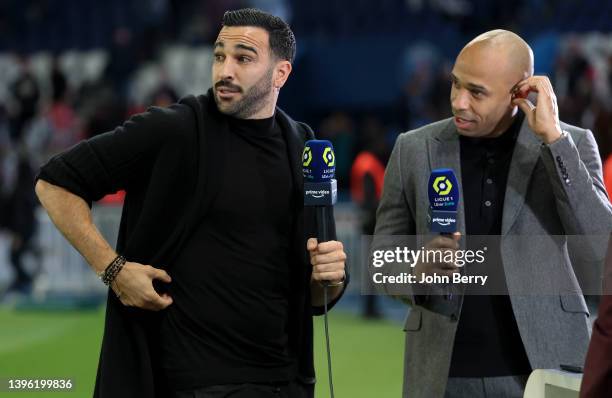 Adil Rami of Troyes Thierry Henry, pundit for Amazon Prime Video following the Ligue 1 Uber Eats match between Paris Saint-Germain and ESTAC Troyes...