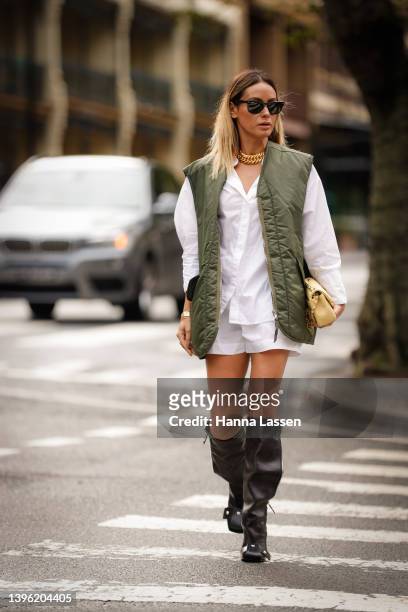 Desiree Deravi wearing LV boots, Desiree Deravi shirt and short, Frankie shop vest, Chanel bag and Ray ban sunniest at Afterpay Australian Fashion...