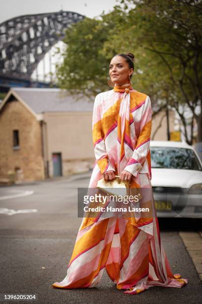 Olympia Valance wearing Fendi maxi dress and bag at Afterpay Australian Fashion Week 2022 on May 09, 2022 in Sydney, Australia.