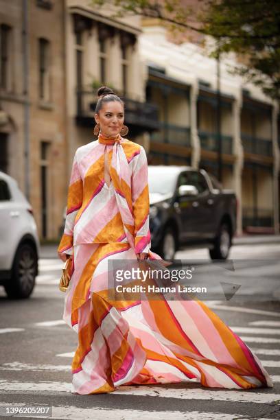 Olympia Valance wearing Fendi maxi dress and bag at Afterpay Australian Fashion Week 2022 on May 09, 2022 in Sydney, Australia.