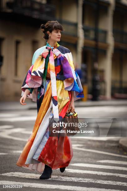 Chloe Hill is seen wearing Rmance Was Born dress and Gucci bag at Afterpay Australian Fashion Week 2022 on May 09, 2022 in Sydney, Australia.