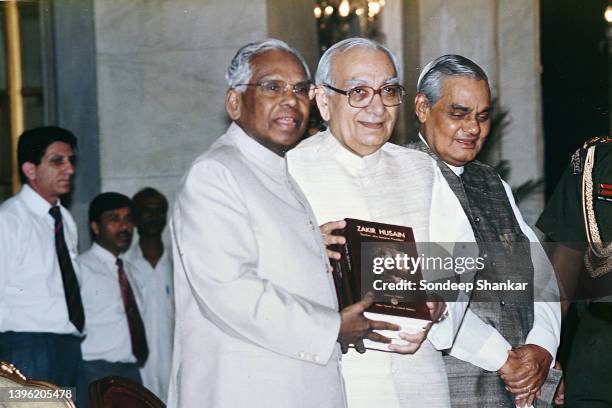 President K R Narayanan with Vice President Krishan Kant and Prime Minister Atal Behari Vajpayee releasing a compadium of titles on former President...