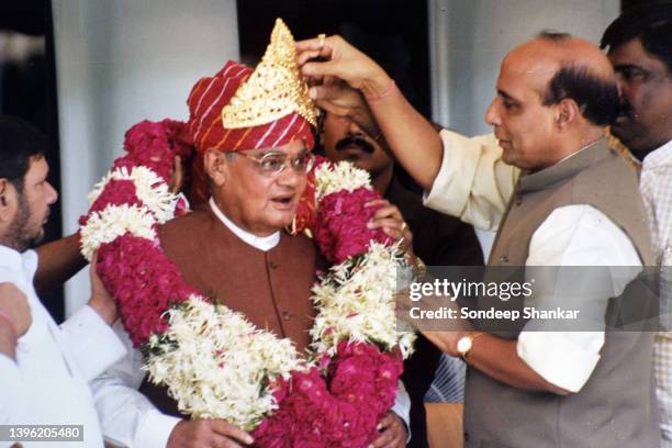 Agriculture Minister Rajnath Singh fixing a crown on the forehead of Prime Minister Atal Behari Vajpayee on his birthday in New Delhi.