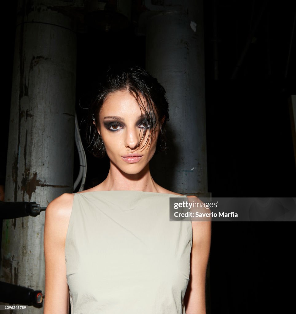 Bec Model A model prepares backstage ahead of the BEC + BRIDGE show during ...