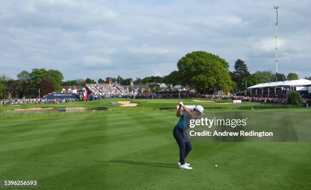 Thorbjorn Olesen of Denmark plays his second shot on the 18th hole on his way to winning the Betfred British Masters hosted by Danny Willett at The...