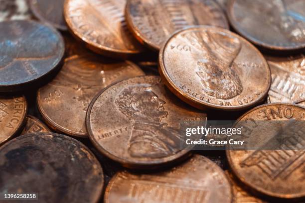 pennies - one cent coin stock pictures, royalty-free photos & images