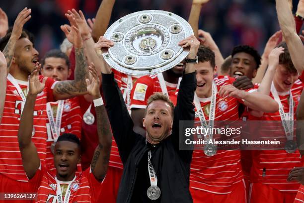 Julian Nagelsmann, Head Coach of FC Bayern Muenchen lifts The Bundesliga Meisterschale trophy following their sides finish as Bundesliga champions...