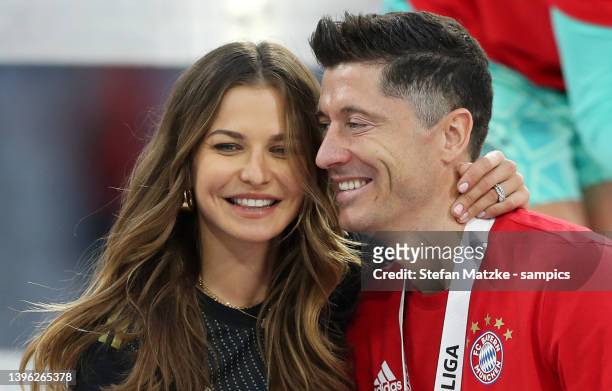Robert Lewandowski of Bayern Muenchen and this wife Anna celebrate after their side finished the season as Bundesliga champions during the Bundesliga...