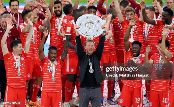 Julian Nagelsmann, Head Coach of FC Bayern Muenchen lifts The Bundesliga Meisterschale trophy following their sides finish as Bundesliga champions...