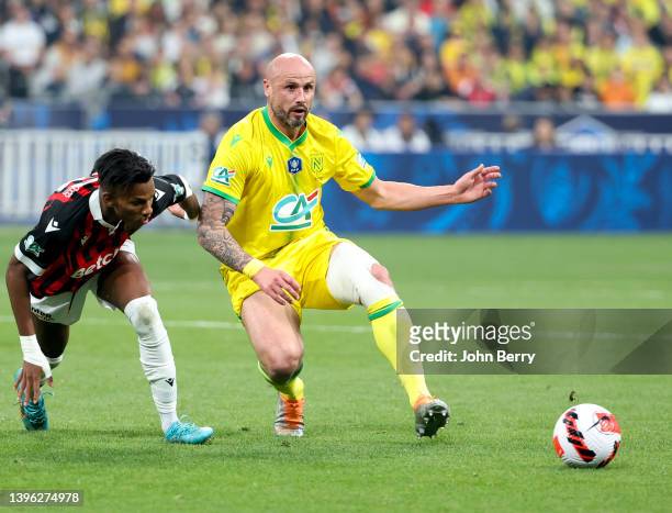 Nicolas Pallois of Nantes, Hicham Boudaoui of Nice during the French Cup Final between OGC Nice and FC Nantes at Stade de France on May 7, 2022 in...