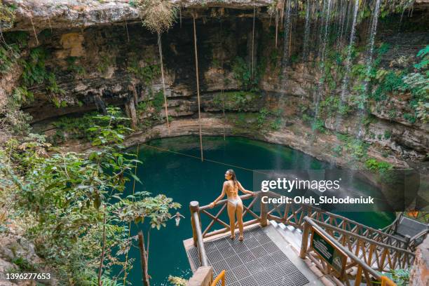 woman in cenote in yucatan, mexico - mérida mexiko bildbanksfoton och bilder