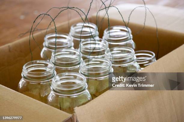 lanterns in a box - mason jar stock pictures, royalty-free photos & images