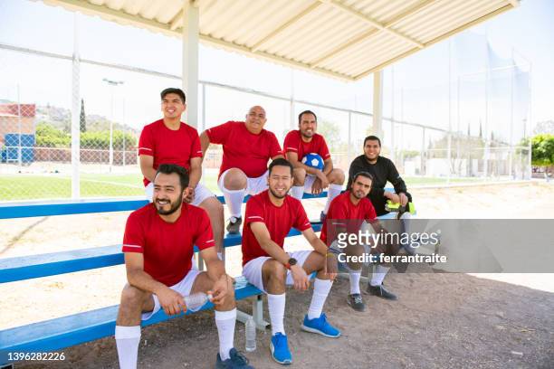 soccer team cheering from bench - club football stock pictures, royalty-free photos & images