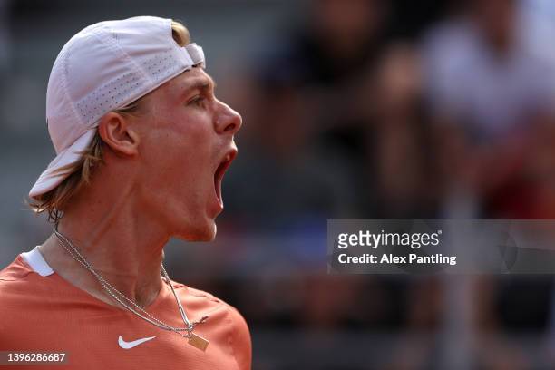 Denis Shapovalov of Canada celebrates winning the first set against Lorenzo Sonego of Italy during their singles first round match in the...
