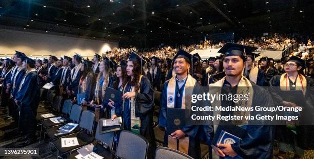 Students listen to speakers during Vanguard University's graduation ceremonies at Mariners Church in Irvine, CA on Thursday, May 5, 2022. More than...