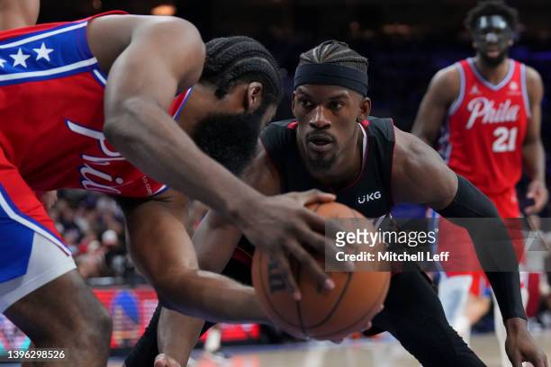 Jimmy Butler of the Miami Heat guards James Harden of the Philadelphia 76ers during Game Four of the 2022 NBA Playoffs Eastern Conference Semifinals...