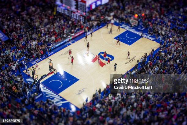 General view of the Wells Fargo Center as James Harden of the Philadelphia 76ers reacts after a made three point basket against the Miami Heat in the...