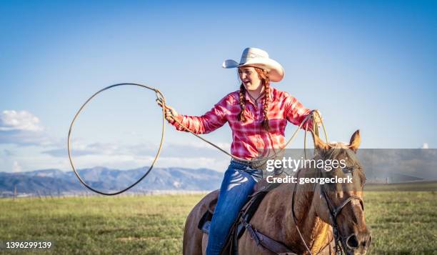 preparing to throw a lasso - ring toss bildbanksfoton och bilder