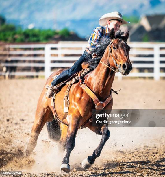 skilful young cowboy - barrel race stock pictures, royalty-free photos & images