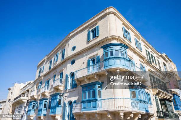 blue balconies in malta - malta culture stock pictures, royalty-free photos & images