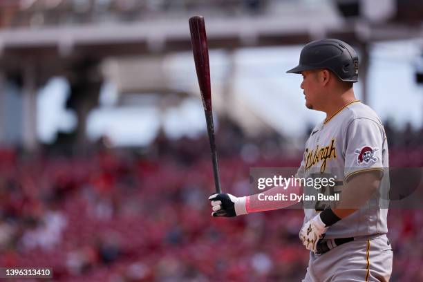 Yoshi Tsutsugo of the Pittsburgh Pirates bats in the ninth inning against the Cincinnati Reds at Great American Ball Park on May 08, 2022 in...