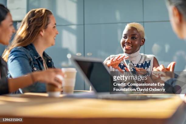 business colleagues in meeting discussing project - black business woman bildbanksfoton och bilder