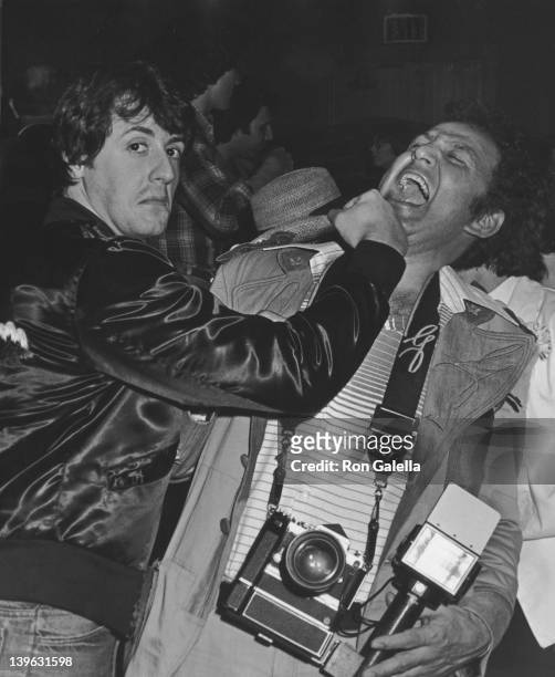 Sylvester Stallone and Ron Galella attend Frank Stallone Performance on February 14, 1978 at the Roxy Theater in West Hollywood, California.
