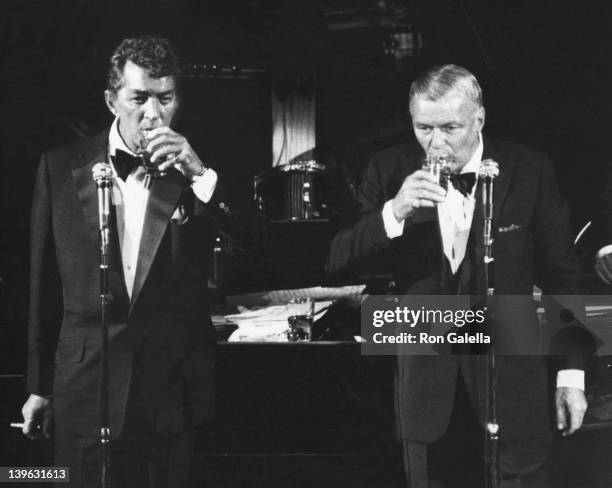 Dean Martin and Frank Sinatra perform in concert on September 20, 1983 at the Waldorf Hotel in New York City.