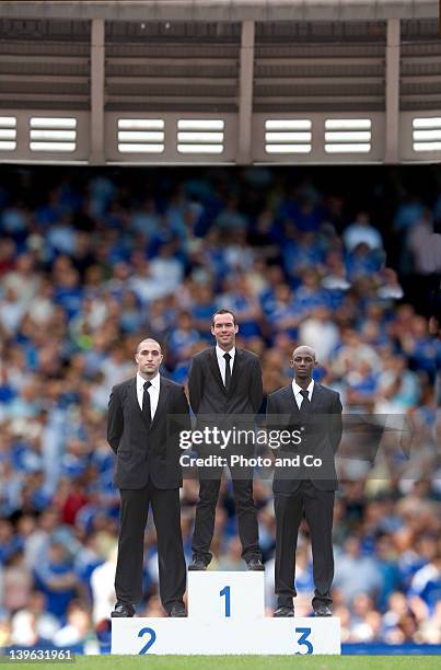 businessmen on podium, in sports stadium - winners podium stock pictures, royalty-free photos & images