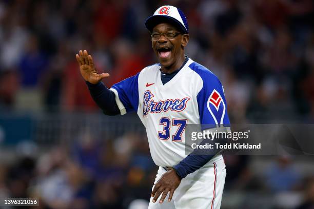 Third base coach, Ron Washington of the Atlanta Braves reacts during the eighth inning of the game against the Milwaukee Brewers at Truist Park on...