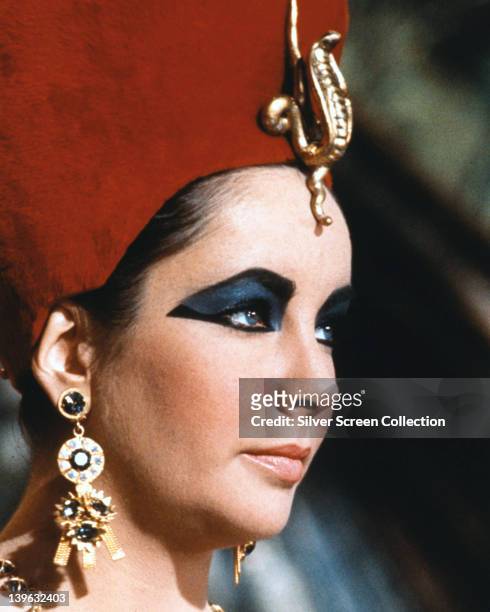 Headshot of Elizabeth Taylor , British actress, in profile in a publicity still issued for the film, 'Cleopatra', 1963. The historical drama,...